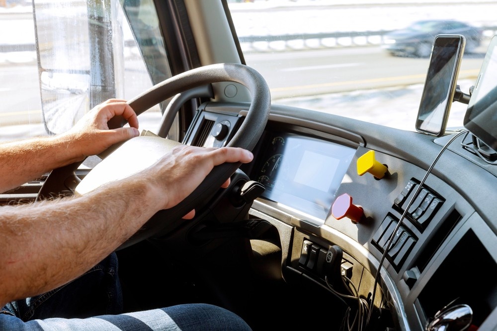 Commercial truck cab with driver and air brake controls—Urgent DOT Physical Houston for CDL compliance and safety.