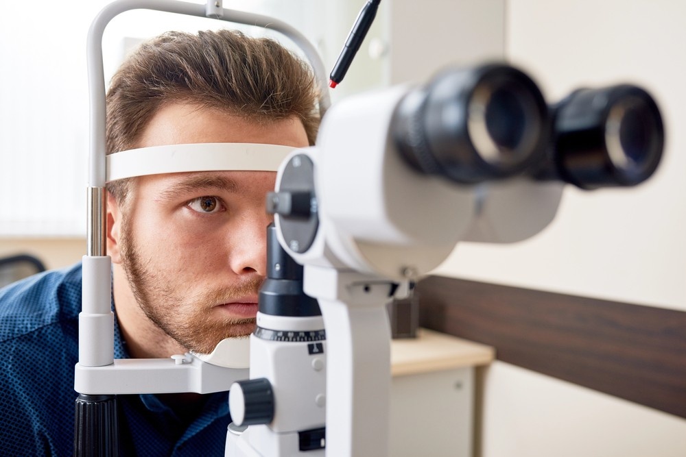 Slit lamp eye exam for vision screening—DOT Medical Card Houston requirements for CDL drivers and medical certification.