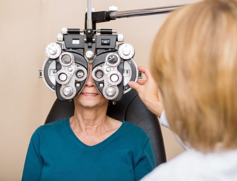 Senior driver receiving a professional vision screening required to pass a mobile DOT Physical Houston TX.