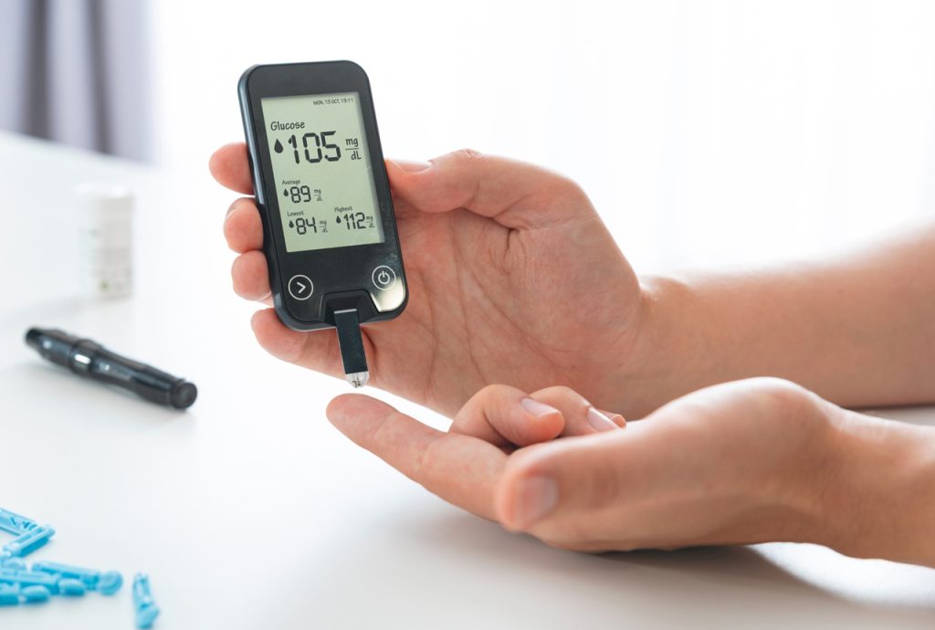 Blood glucose testing for diabetes screening during a CDL medical exam Houston to verify driver health standards.