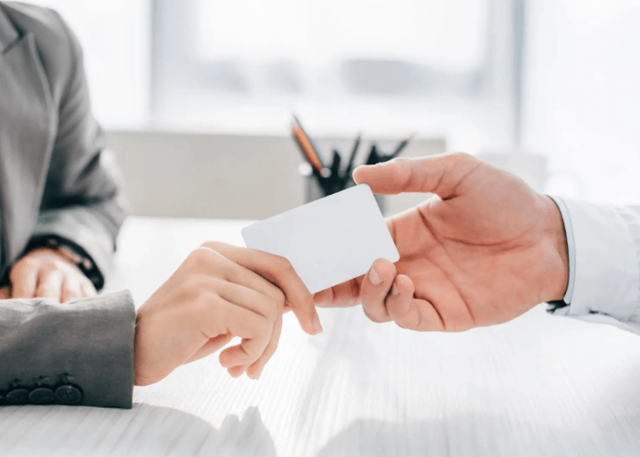 Patient receiving a medical clearance card from a professional DOT certified medical examiner Houston provider.