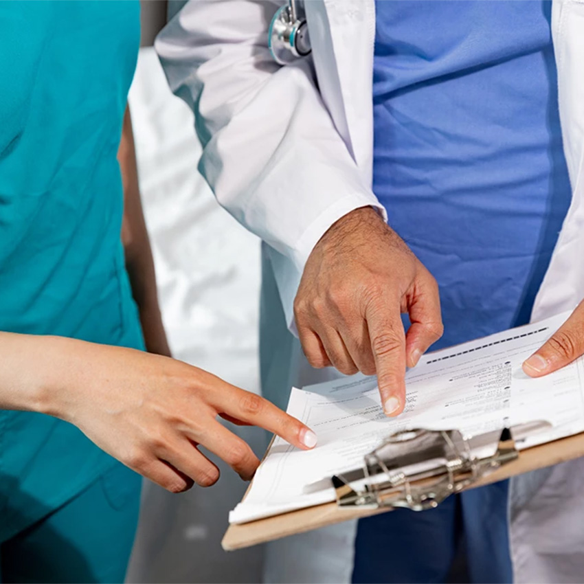 Our medical examiner reviews essential health history records for a certified CDL DOT Physical Houston appointment.