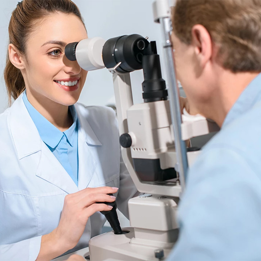 A medical professional conducting a required eye test for a certified DOT Physical Exam Houston TX appointment.